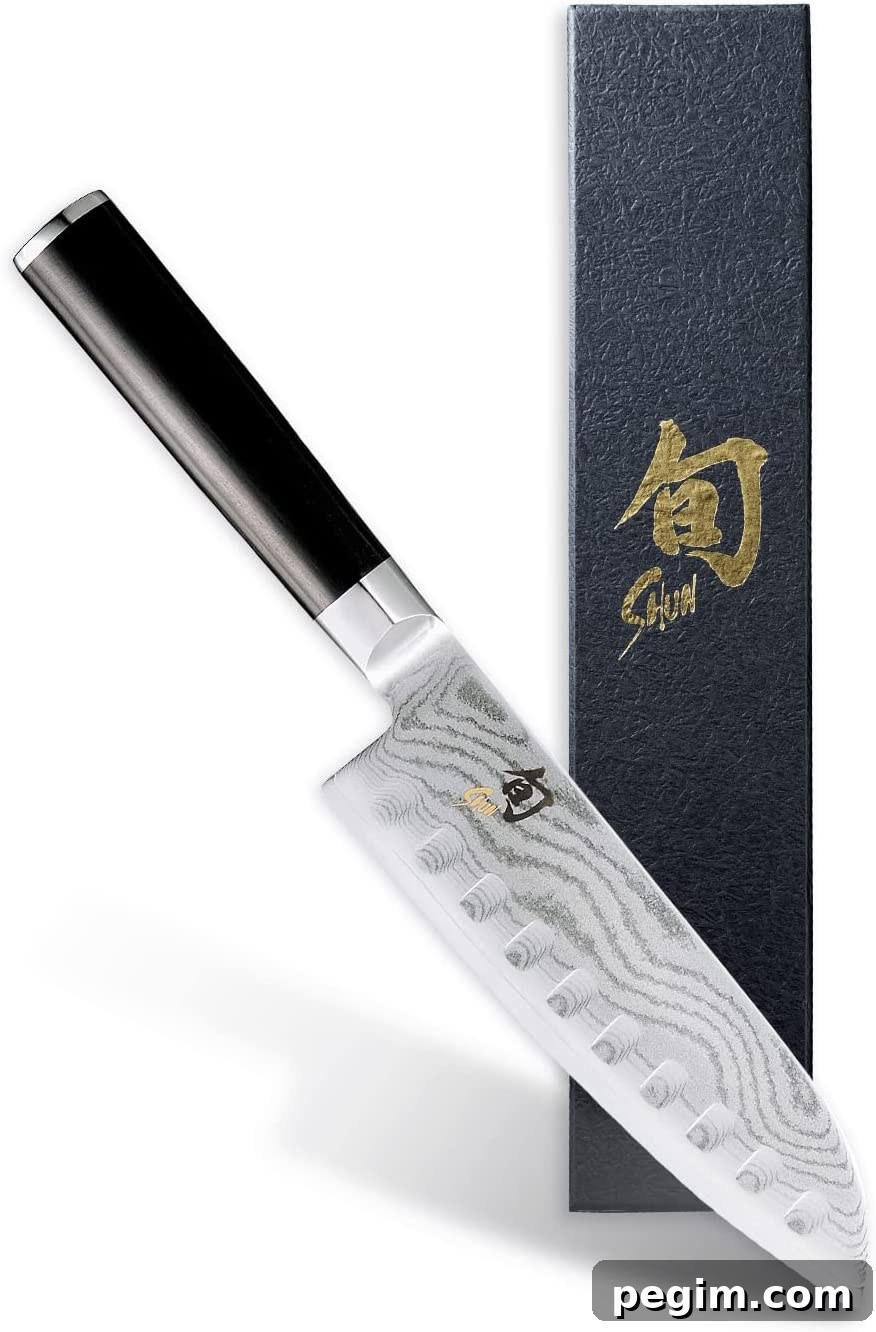Shun Classic 7” Hollow-Ground Santoku All-Purpose Kitchen Knife.