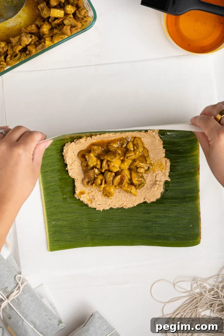 Pasteles being folded.