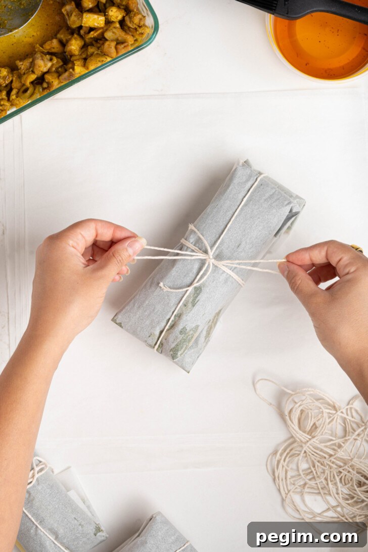 Pasteles being tied off.