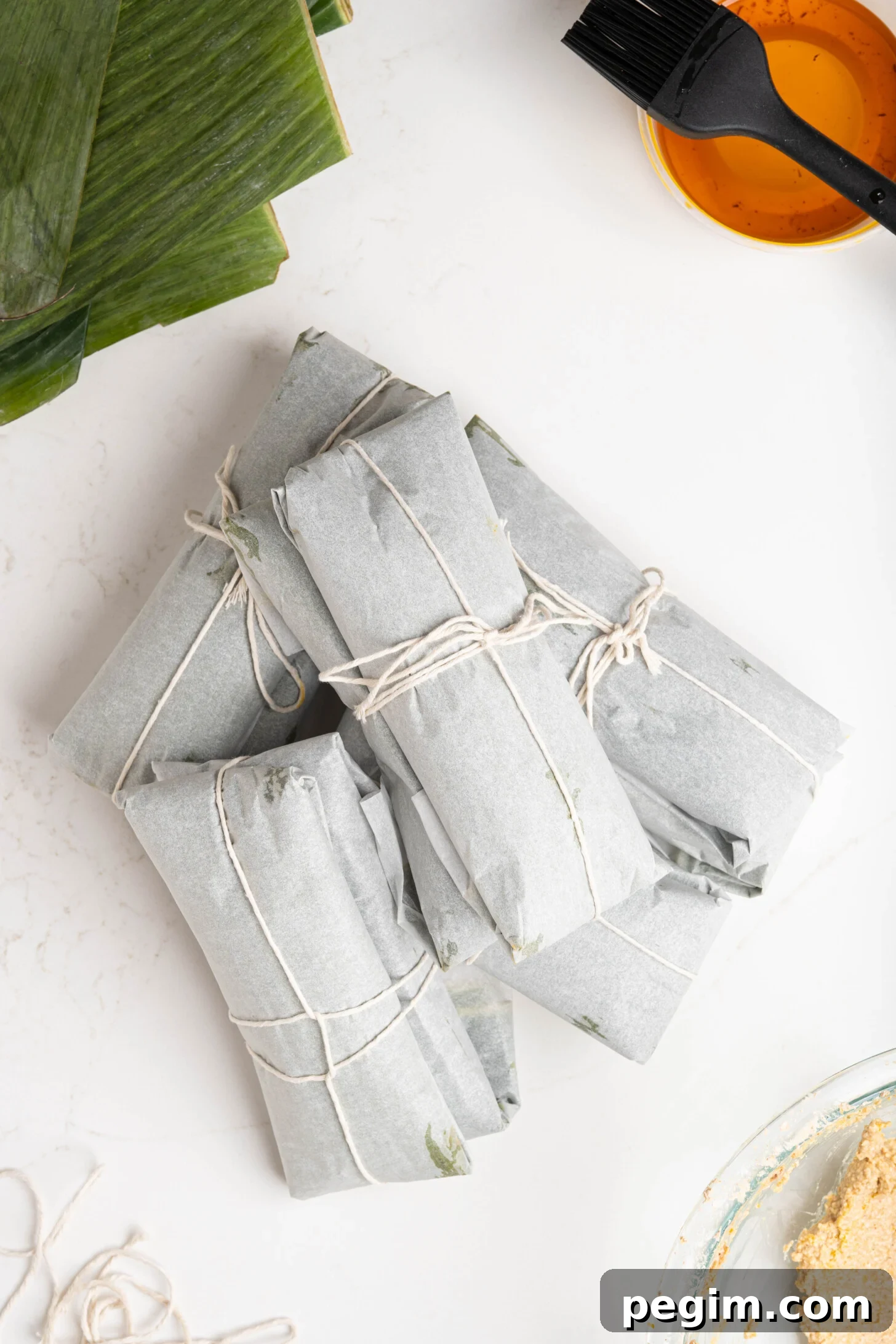 Pasteles on a white counter.