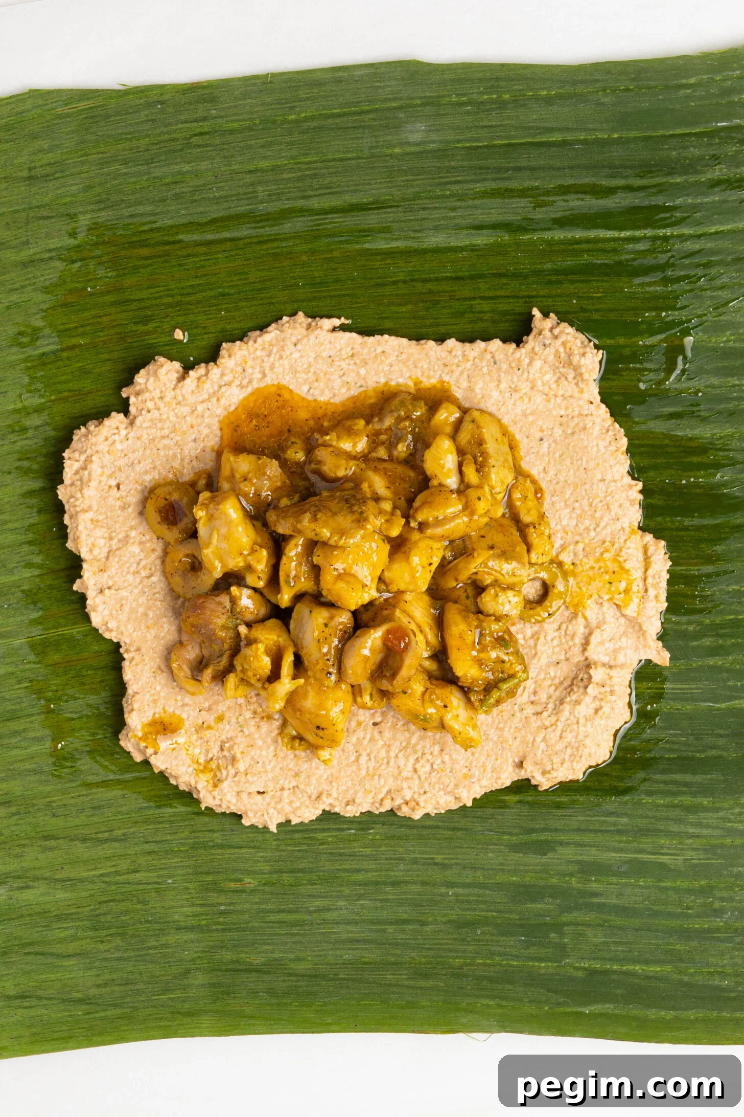 Chicken filling on masa.