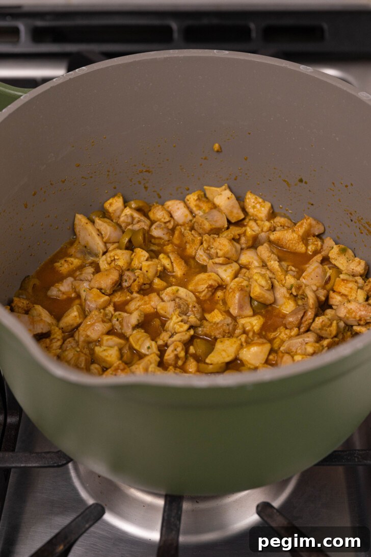Pasteles chicken filling in a pot.