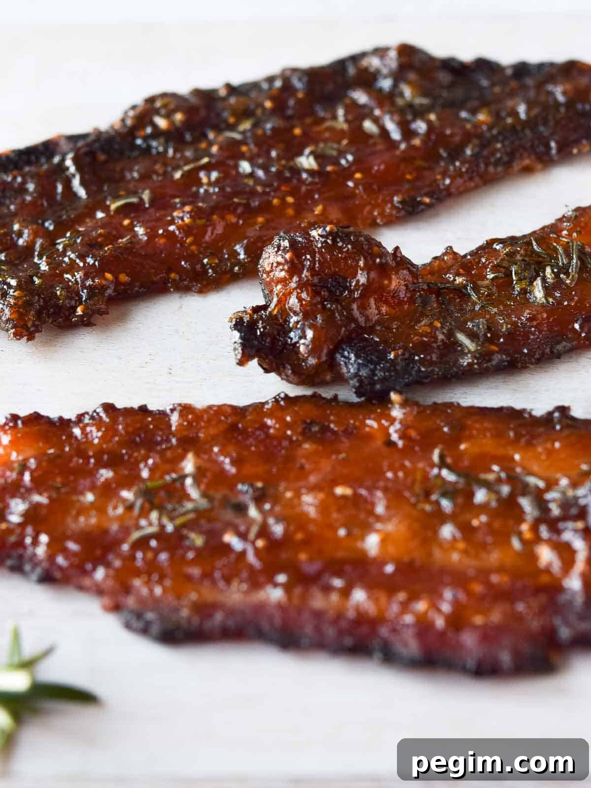 Close-up of candied rosemary and fig bacon.