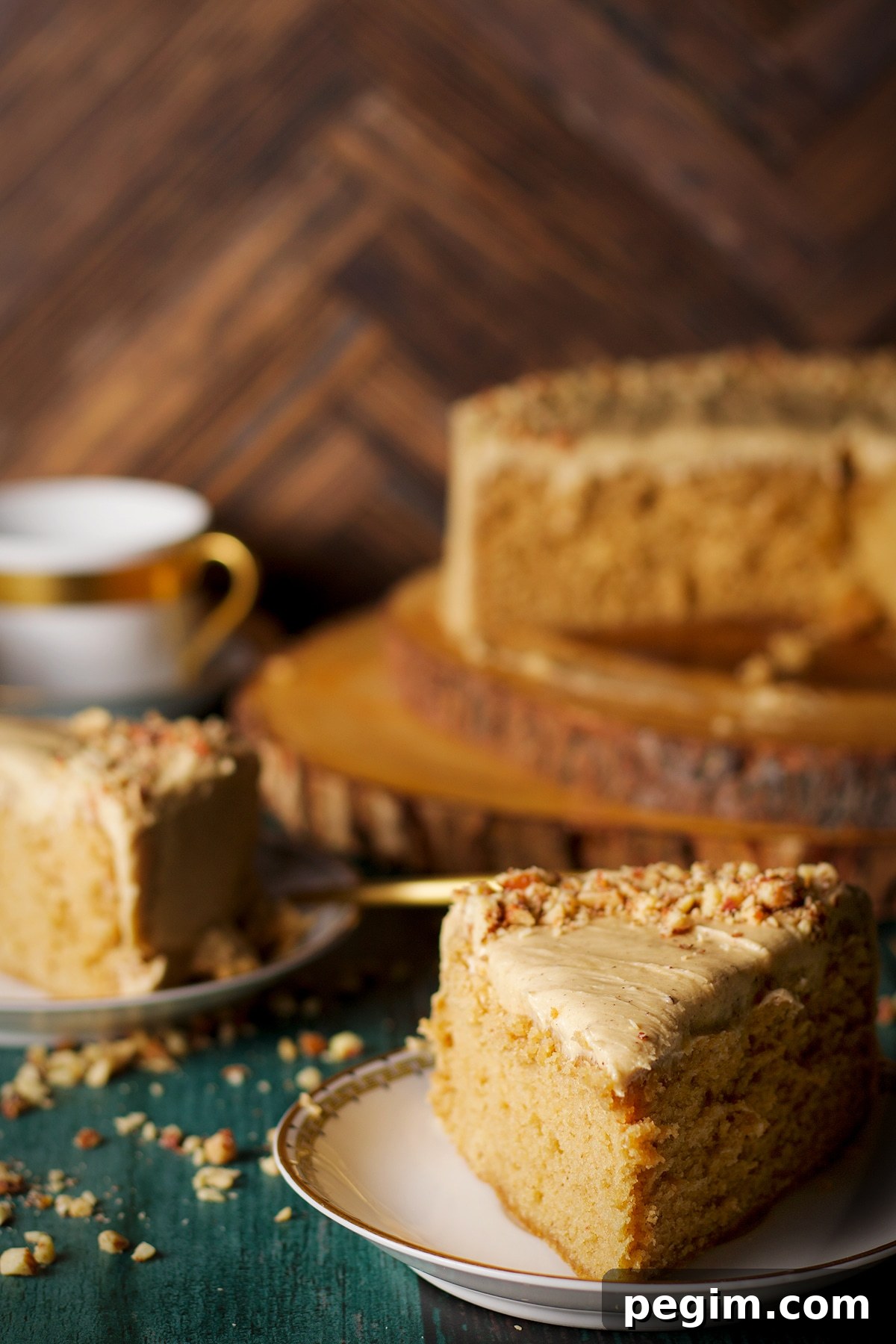 Two slices of brown butter cake on small dessert plates.