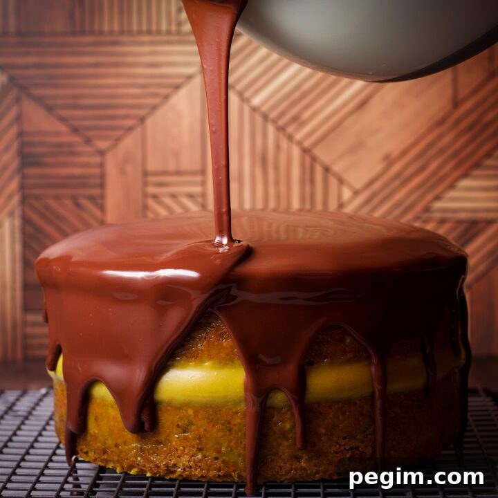 Pouring warm chocolate ganache over a two layer cake so the ganache covers the top and the sides of the cake.