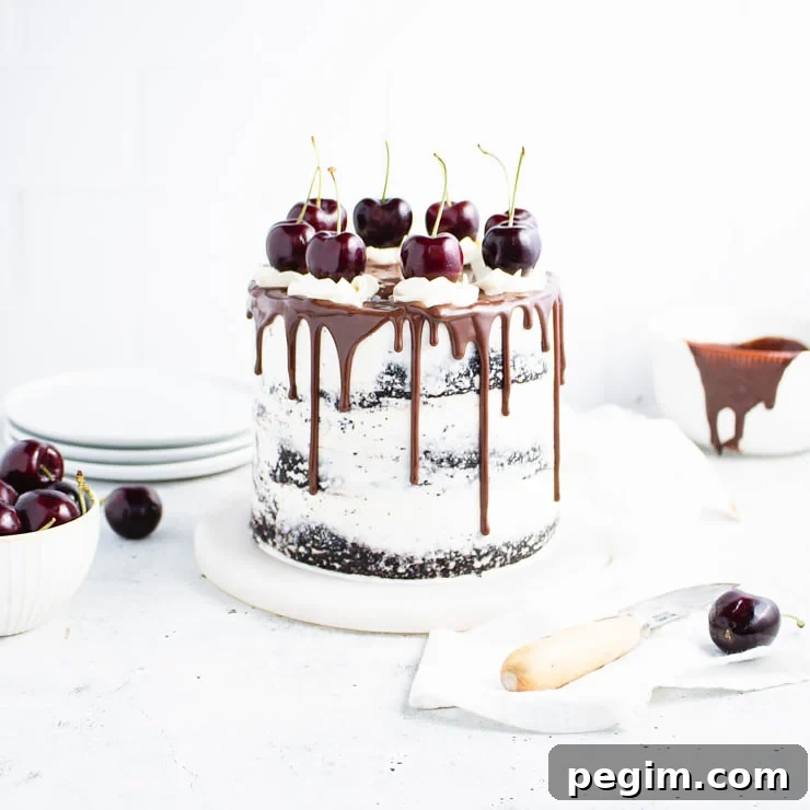black forest cake with a chocolate ganache drip.