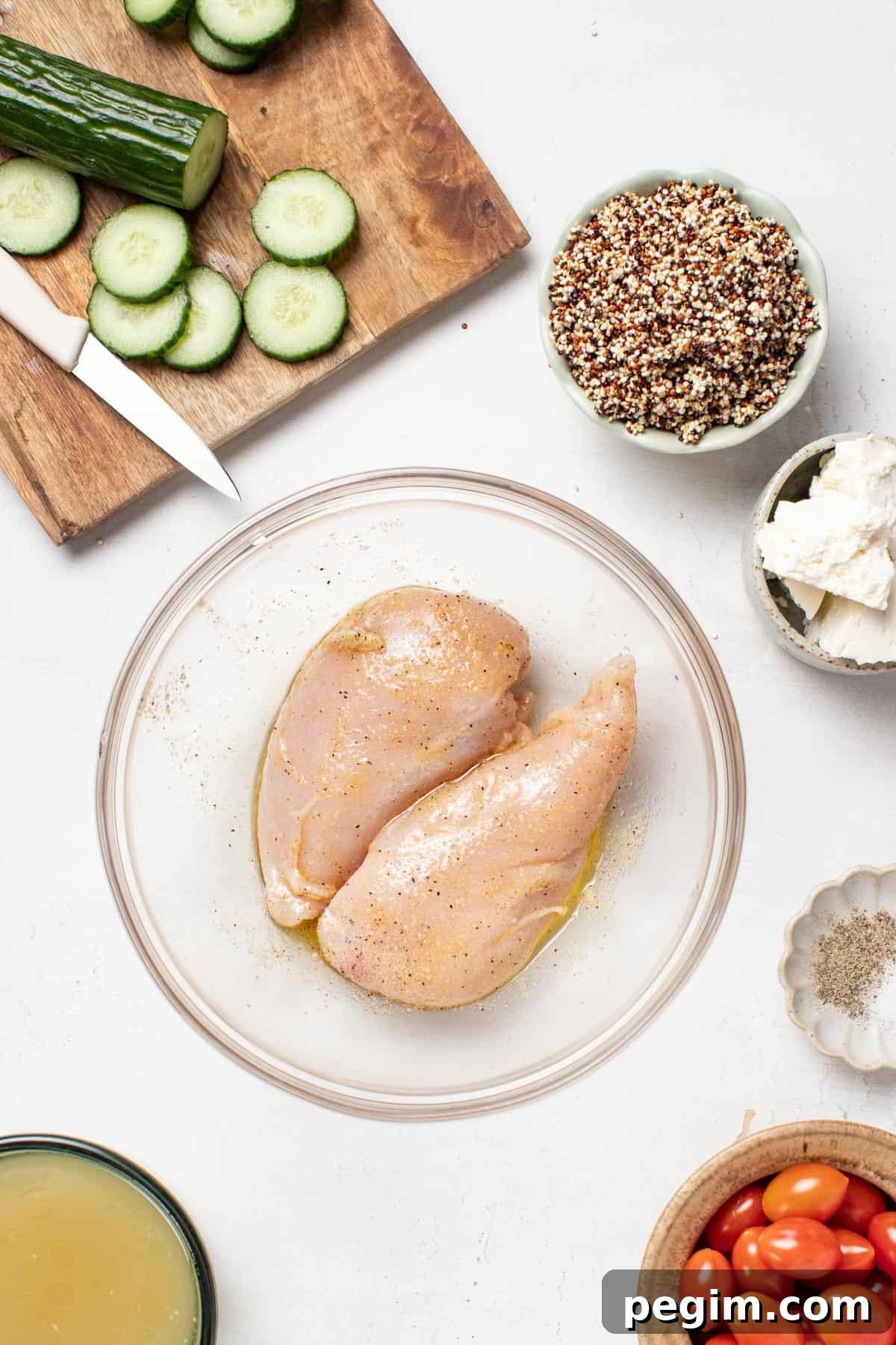 Thin sliced chicken breasts in a seasoning mixture.