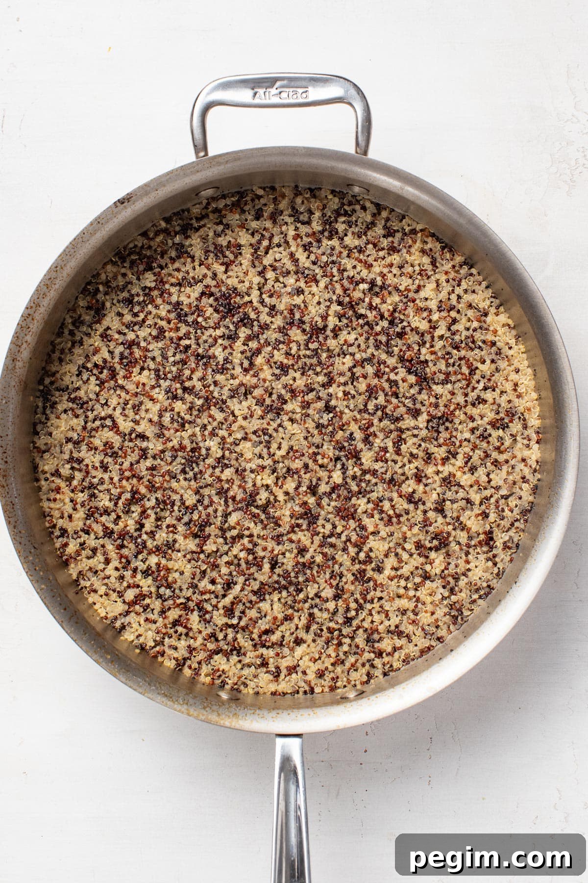 Cooked quinoa in a pan.