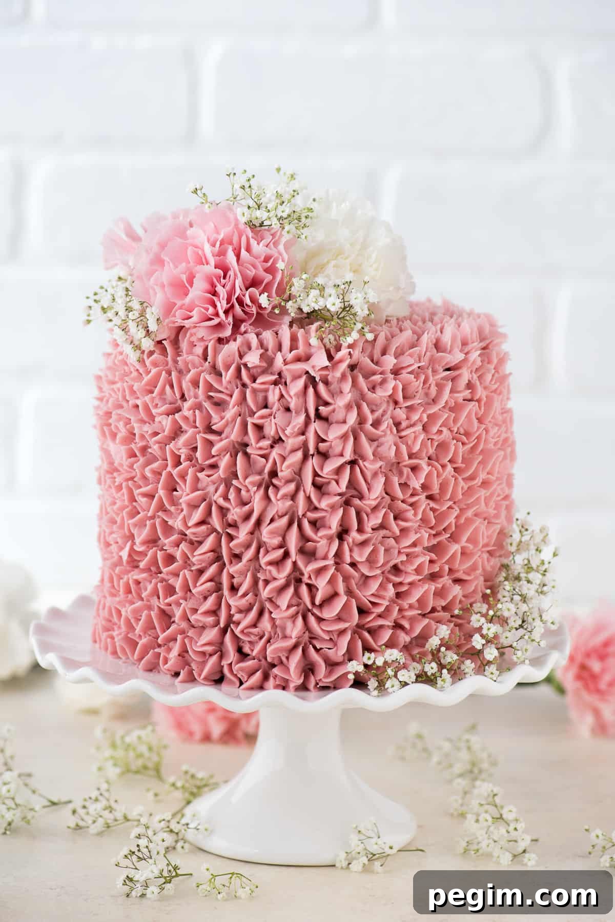 Made from scratch raspberry chocolate cake! Features 3 layers of classic chocolate cake with a raspberry jam buttercream.