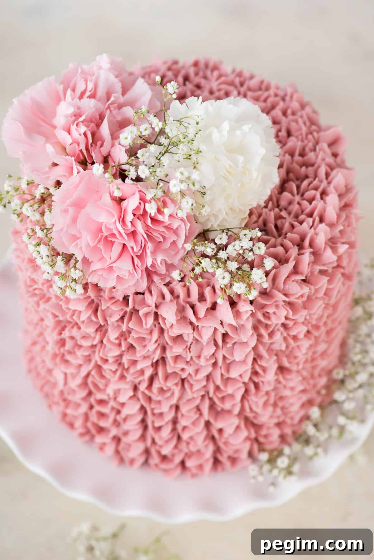 Made from scratch raspberry chocolate cake! Features 3 layers of classic chocolate cake with a raspberry jam buttercream.