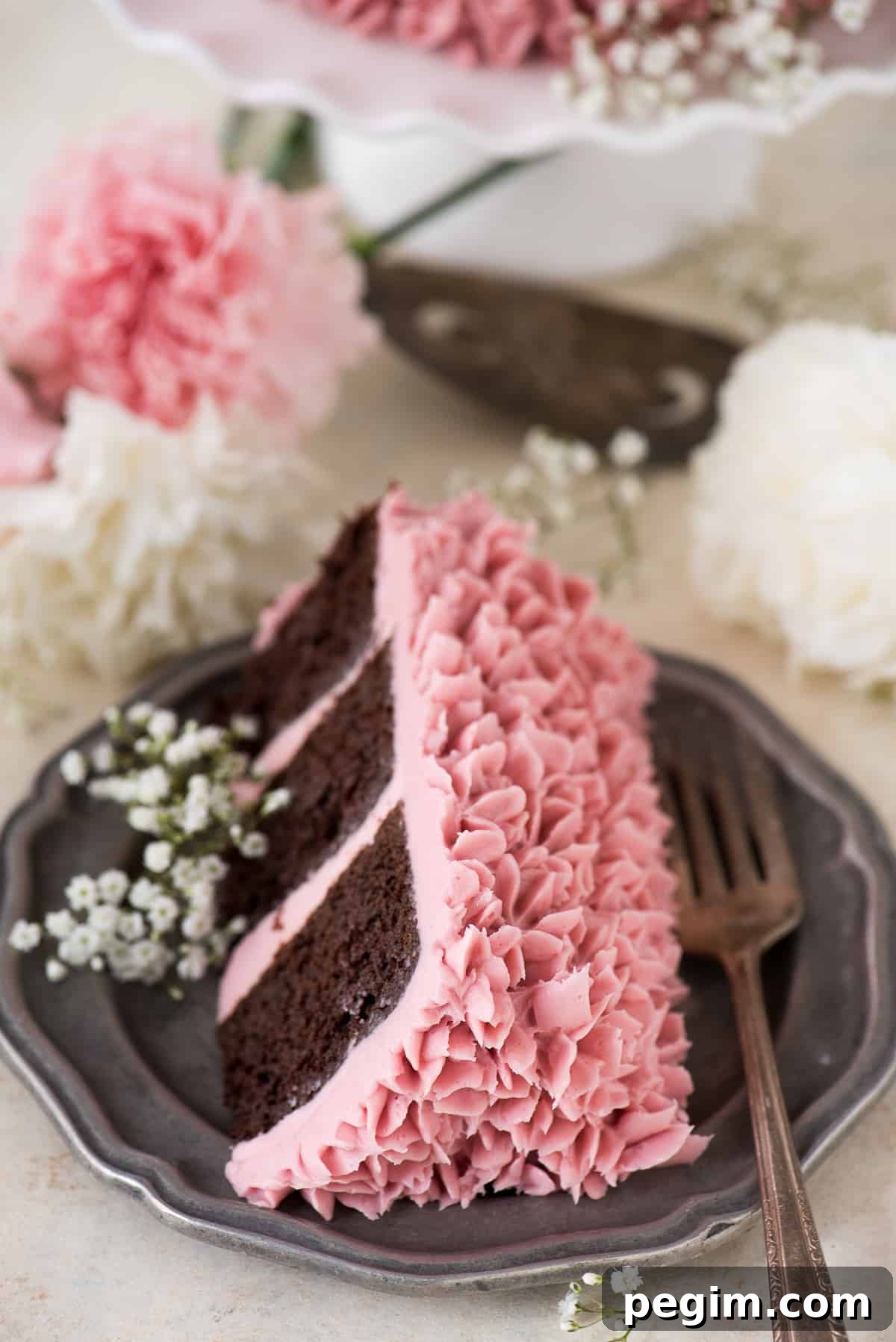 Made from scratch raspberry chocolate cake! Features 3 layers of classic chocolate cake with a raspberry jam buttercream.