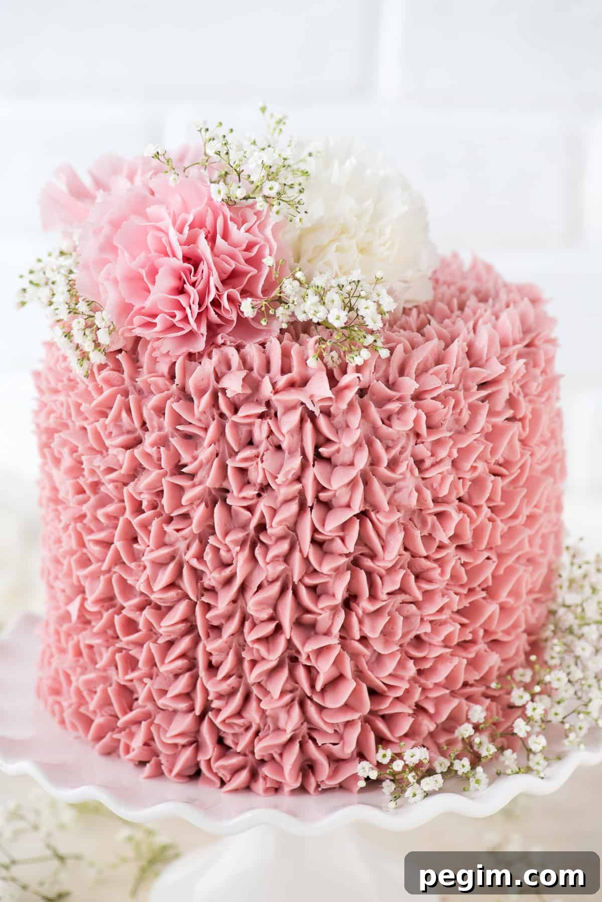 Made from scratch raspberry chocolate cake! Features 3 layers of classic chocolate cake with a raspberry jam buttercream.