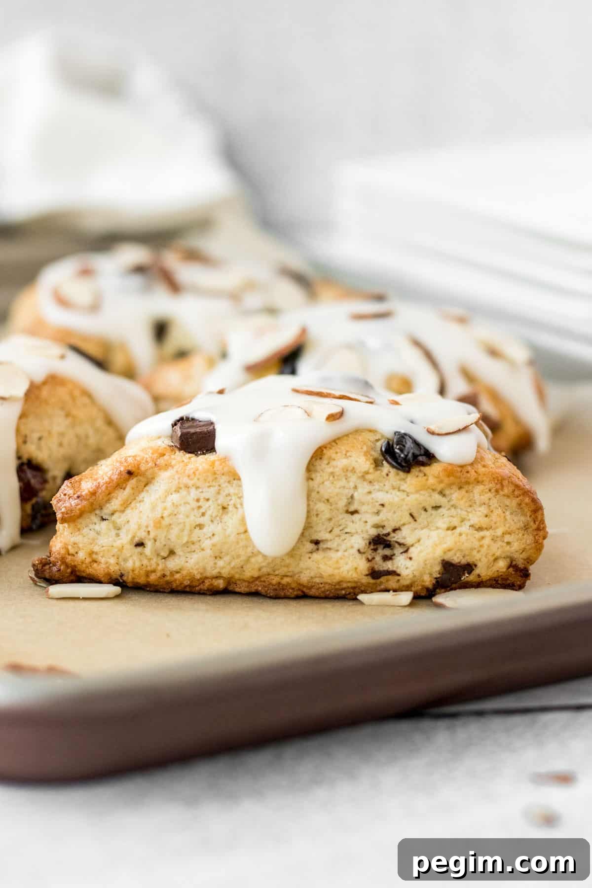 Chocolate Cherry Almond Scones Recipe — Tender, Flaky & Rich 10 single scone with almond glaze