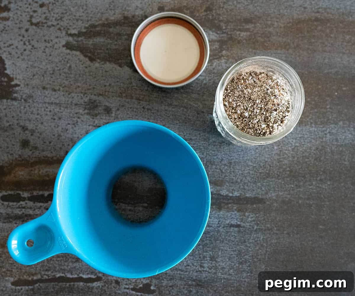 steak rub in a jar with a canning funnel