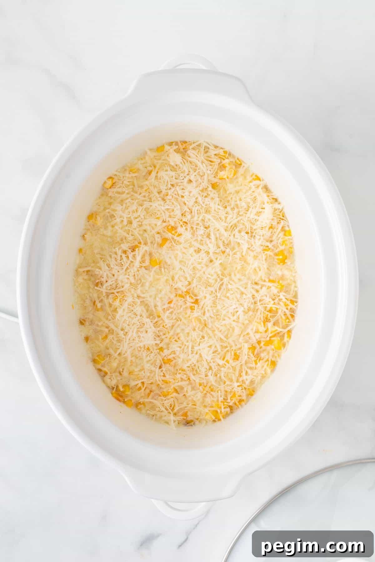 adding parmesan cheese
