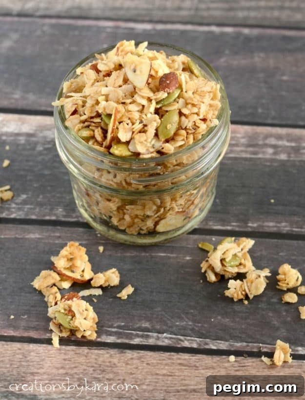 tiny mason jar filled with coconut granola