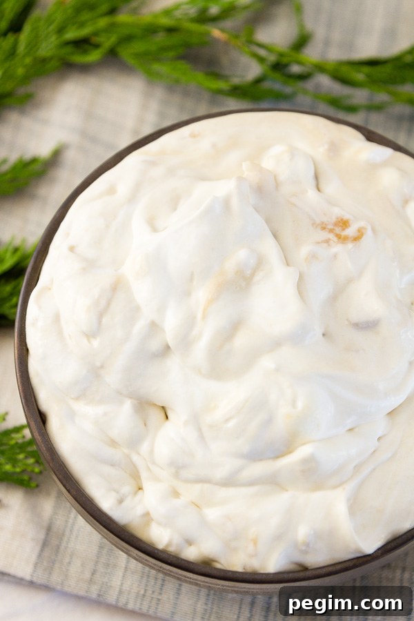 a bowl full of Peach Caramel Whipped Cream