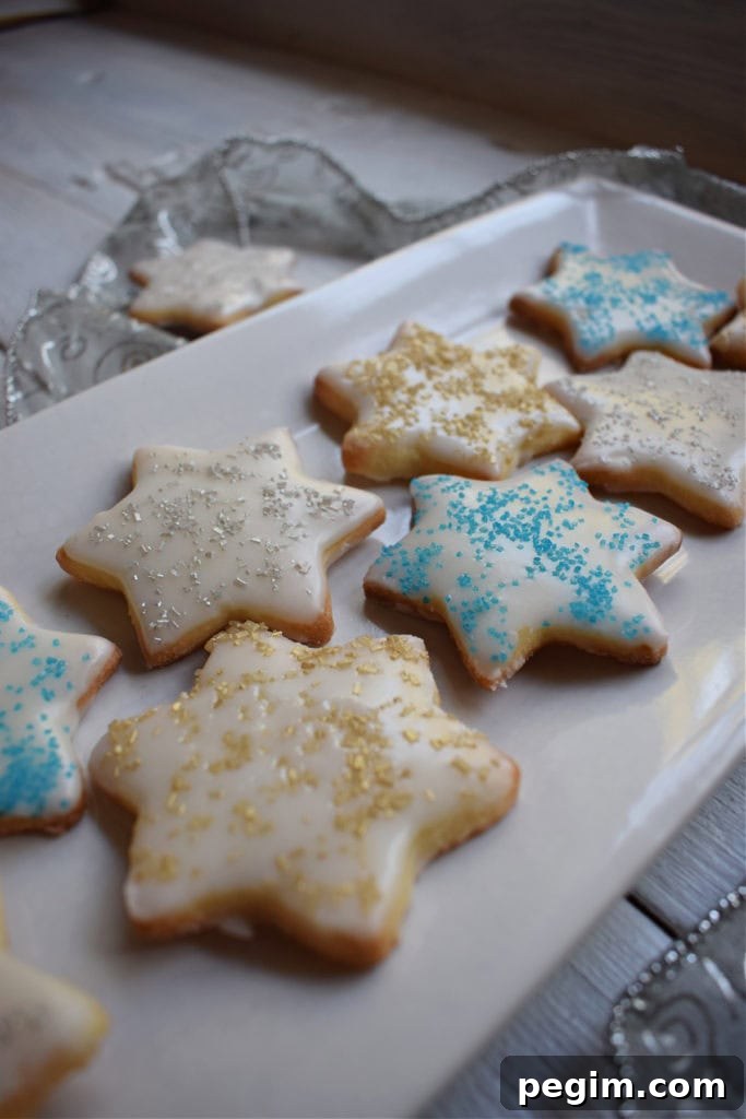 christmas sugar cookies on a white plate