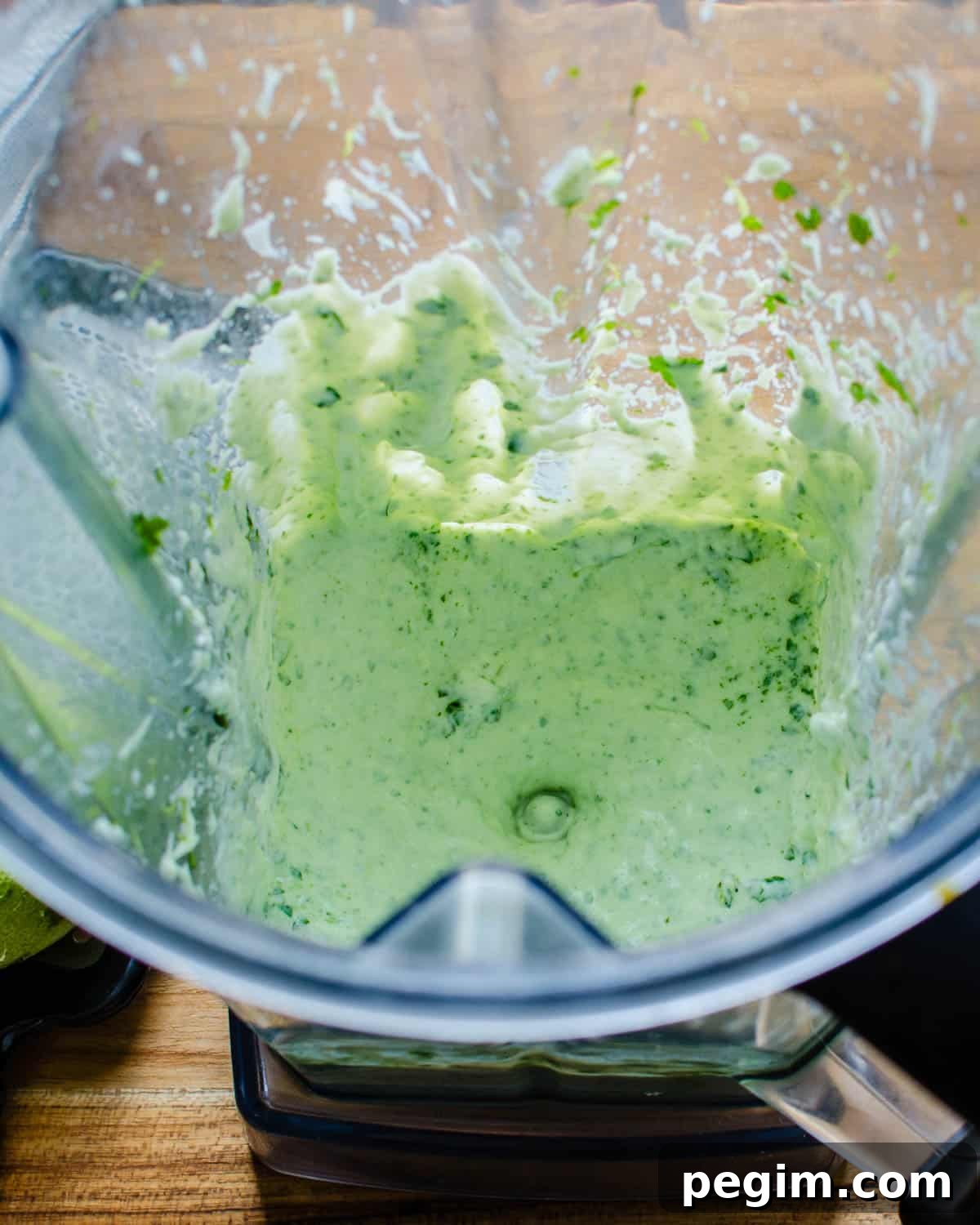 assembling the lime crema in a blender. 