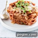 Slow Cooker Spaghetti with Savory Tomato Meat Sauce 5 a bowl of crockpot spaghetti casserole