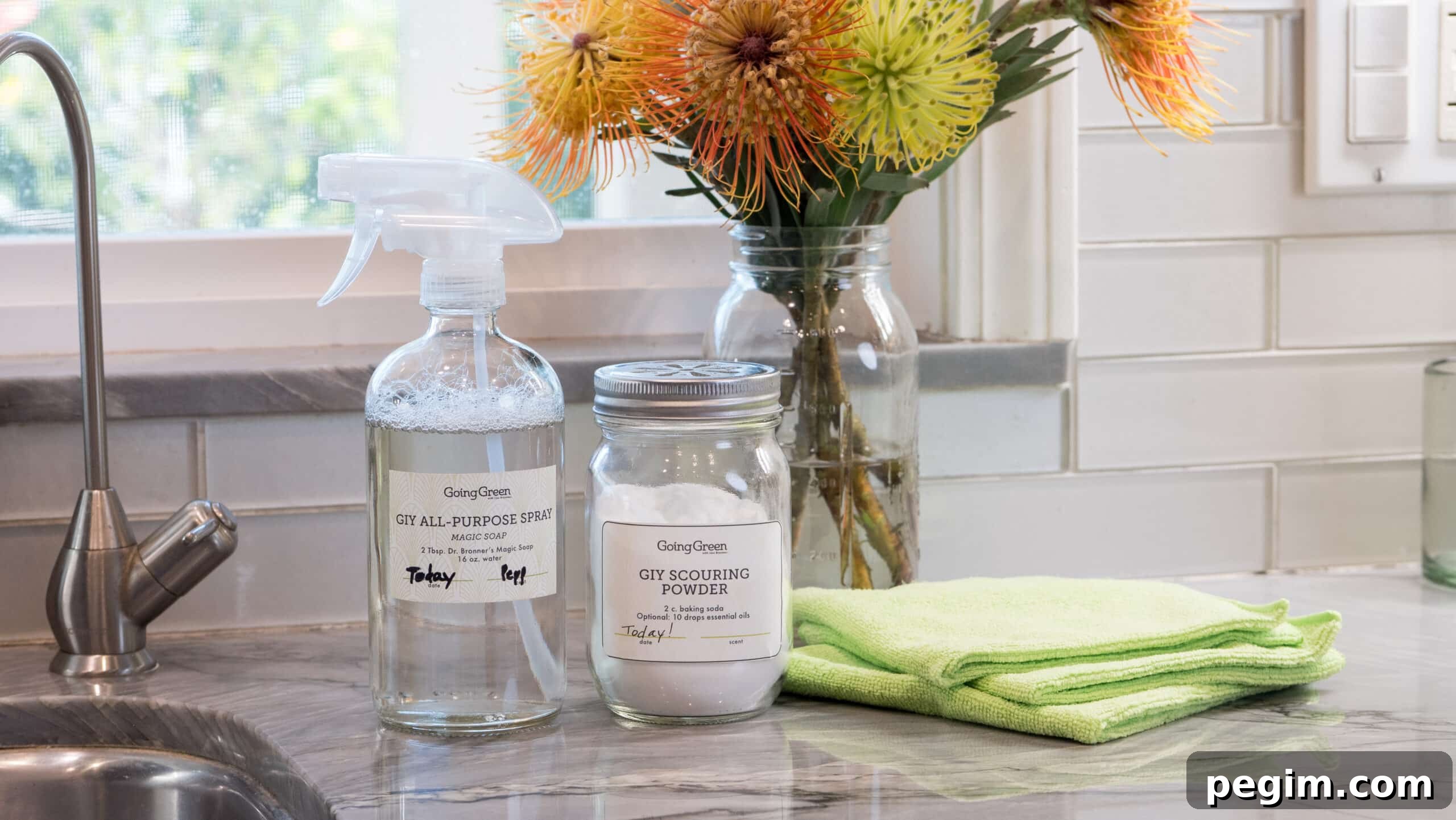 Bottle of All-Purpose Spray and jar of Baking Soda on counter.