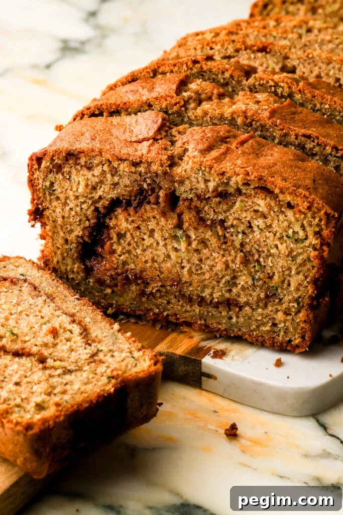 zucchini bread with a cinnamon swirl in the center