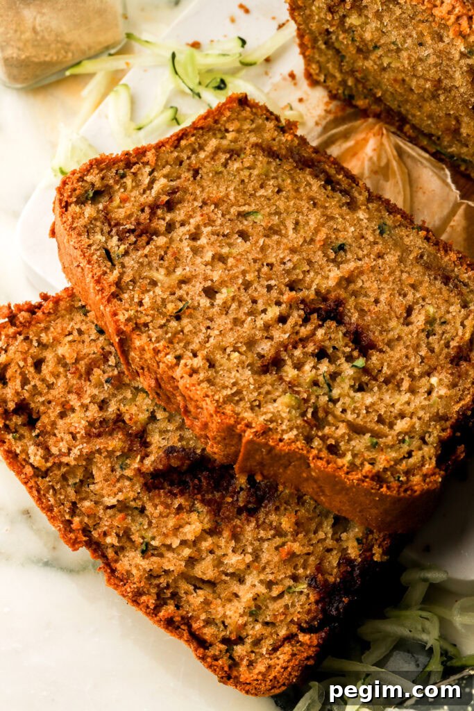 two slices of zucchini bread sliced