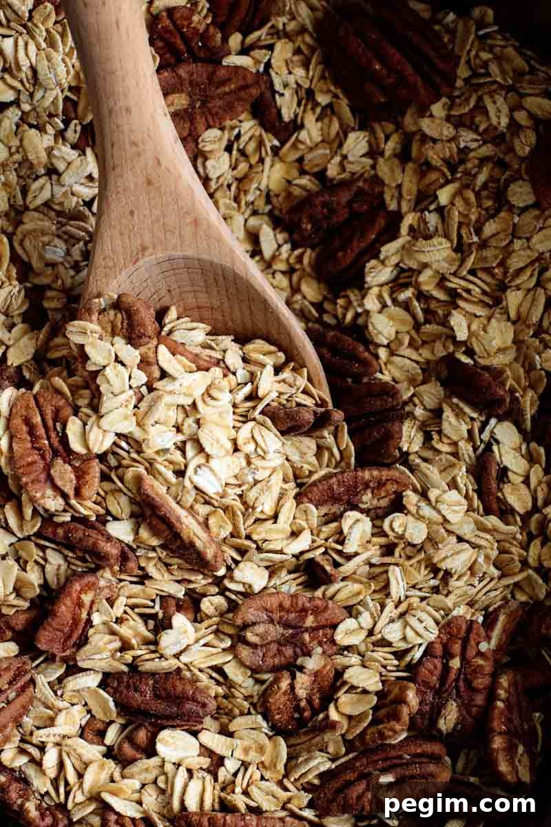 All ingredients mixed in a bowl with a wooden spoon.