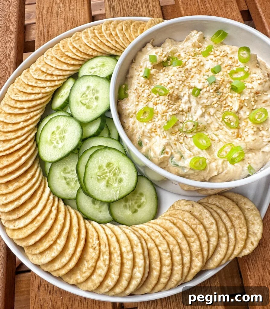 Toasted sesame dip with sliced cucumbers 