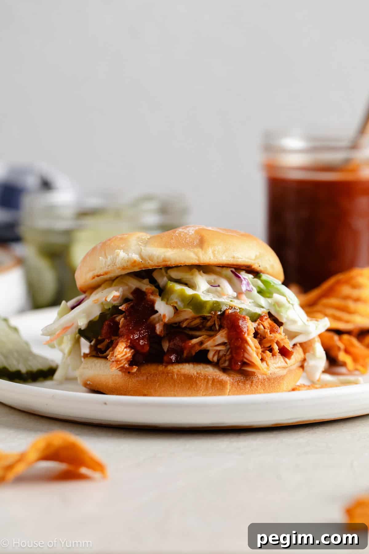 BBQ Chicken sandwich with pickles and coleslaw.