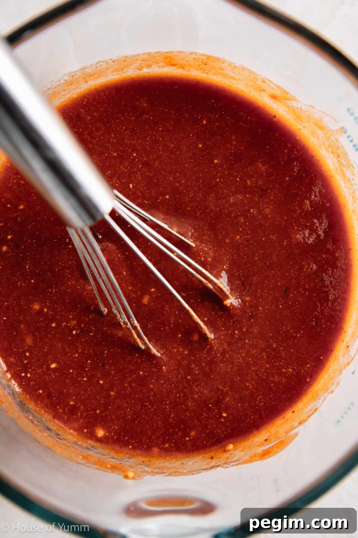 BBQ sauce in a measuring cup after whisking together.