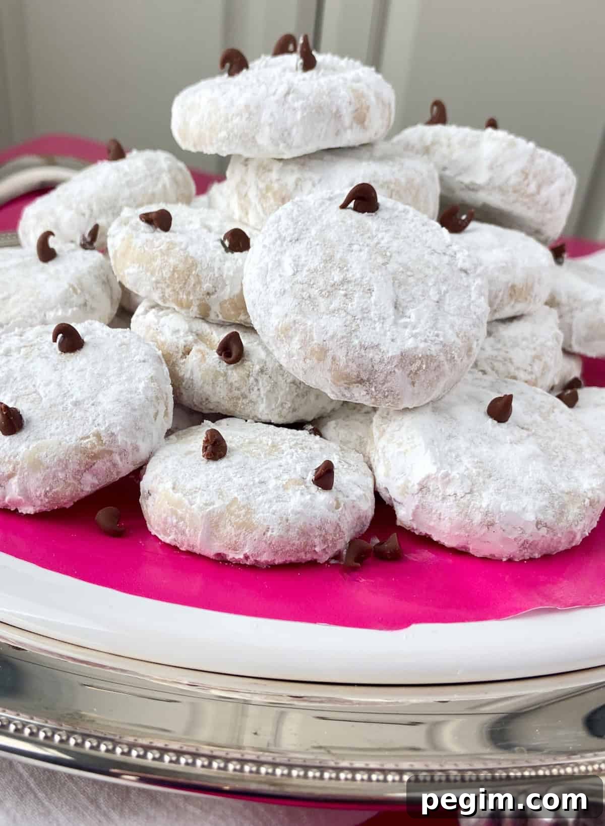Danish Wedding Cookies on silver tray.