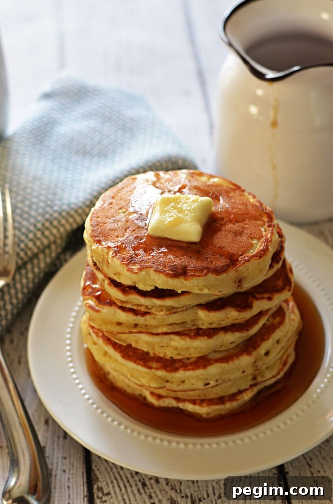 Fluffy Old Fashioned Pancakes.  These pancakes are almost as easy as bisquick, and don't require buttermilk (but you still get that signature flavor!)  Check out the recipe to find out how to make the most perfect pancakes in just minutes. | hostthetoast.com