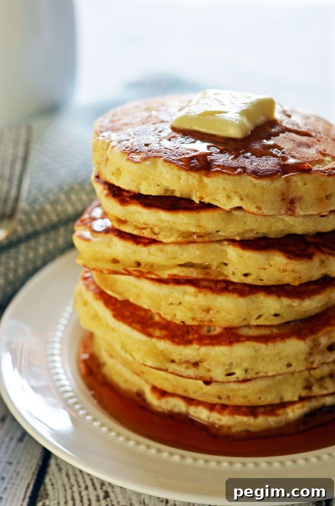 Fluffy Old Fashioned Pancakes.  These pancakes are almost as easy as bisquick, and don't require buttermilk (but you still get that signature flavor!)  Check out the recipe to find out how to make the most perfect pancakes in just minutes. | hostthetoast.com