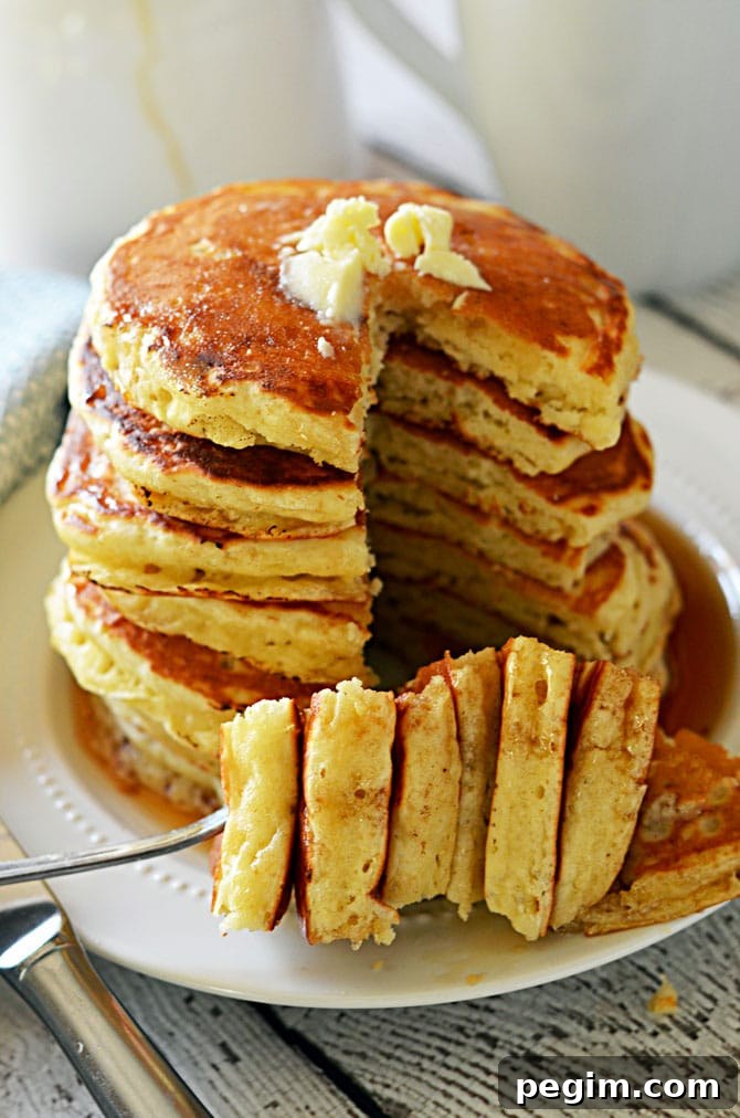 Fluffy Old Fashioned Pancakes.  These pancakes are almost as easy as bisquick, and don't require buttermilk (but you still get that signature flavor!)  Check out the recipe to find out how to make the most perfect pancakes in just minutes. | hostthetoast.com