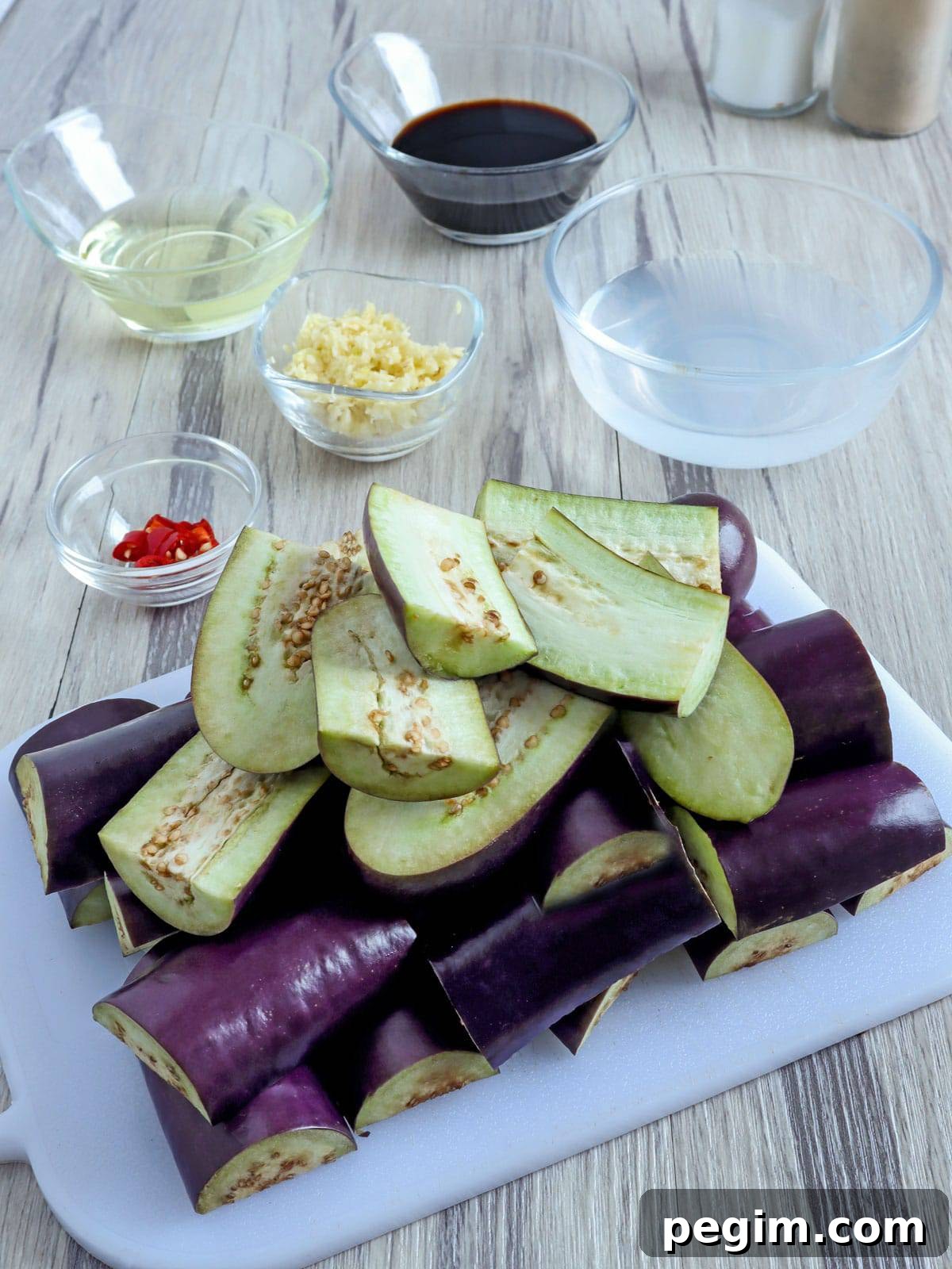 sliced eggplants, minced garlic, chili peppers, vinegar, soy sauce