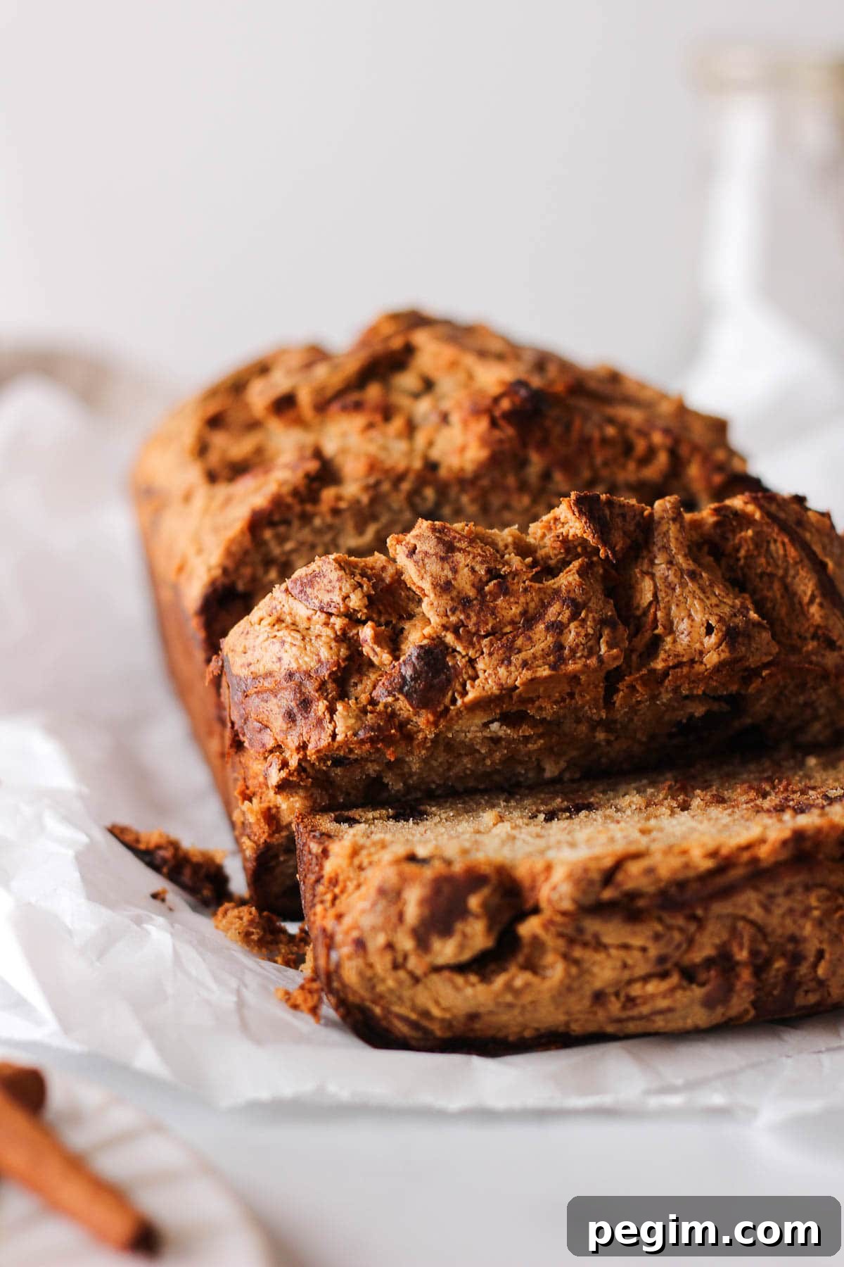 sliced loaf of peanut butter banana bread for baking blog and food photography