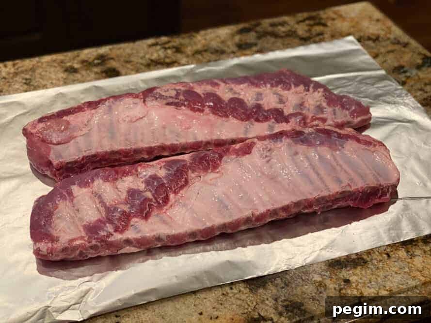 Removing membrane from ribs