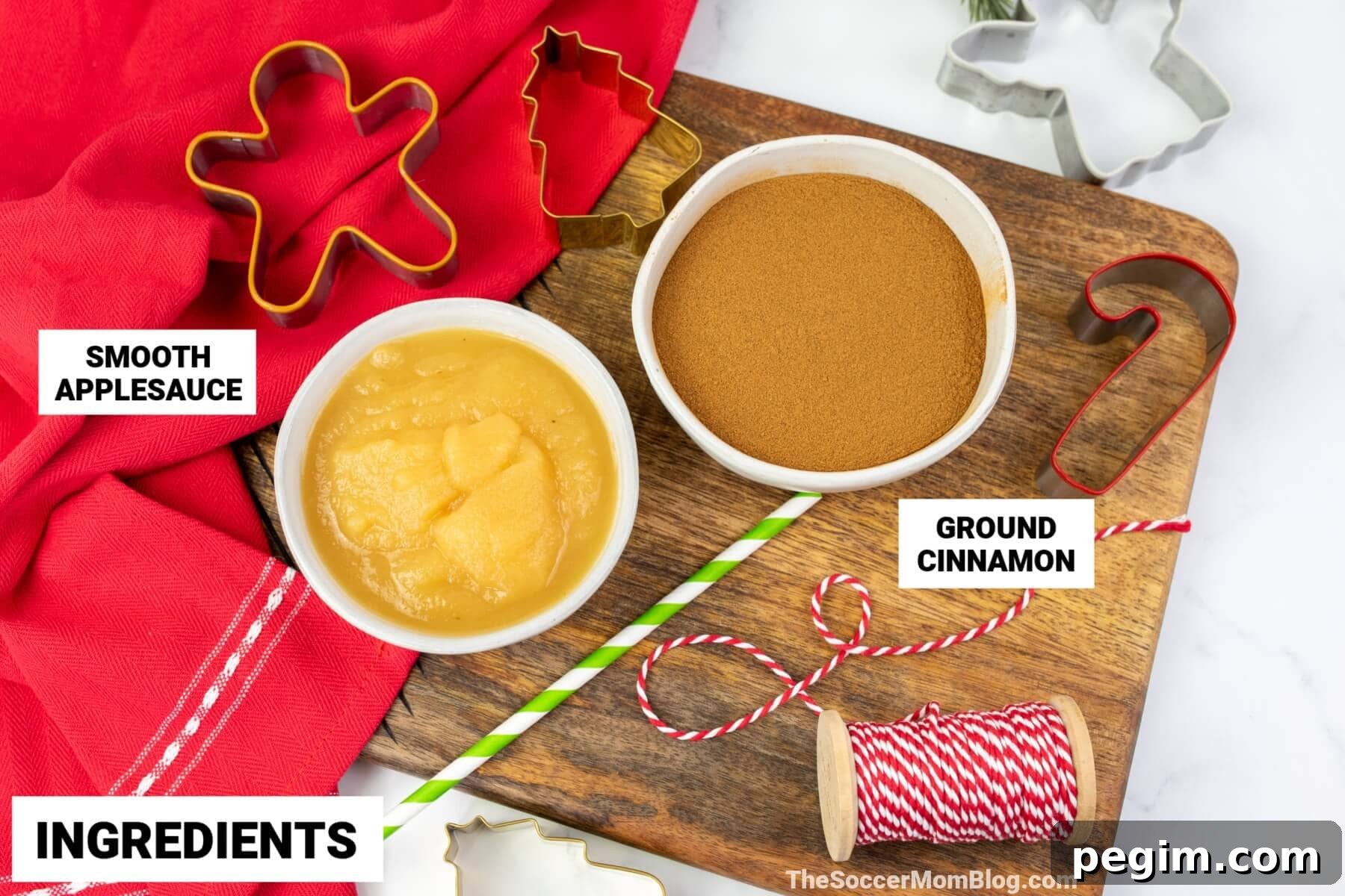 ingredients to make cinnamon ornaments: applesauce and ground cinnamon.