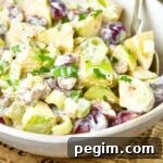 Waldorf salad in white bowl