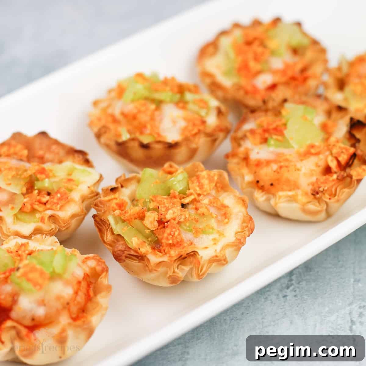 buffalo shrimp bites on white dish
