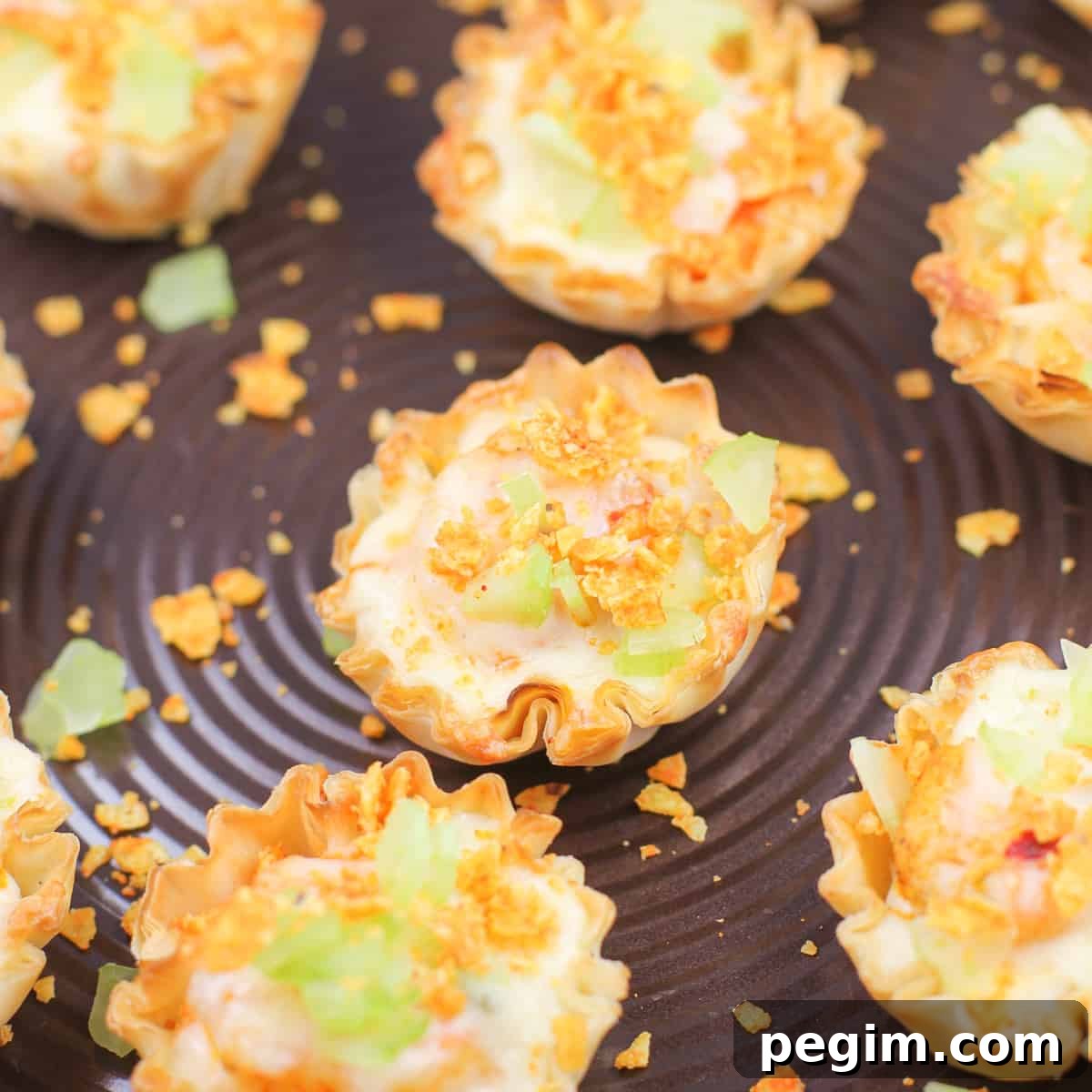 buffalo shrimp bites on metal bake sheet