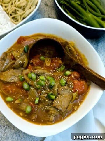 Cantonese-style pork and tomato stir-fry.