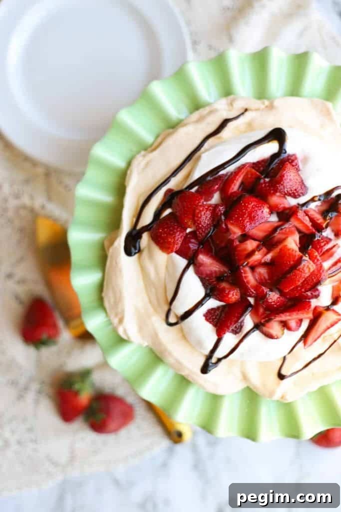 strawberry pavlova on a serving plate