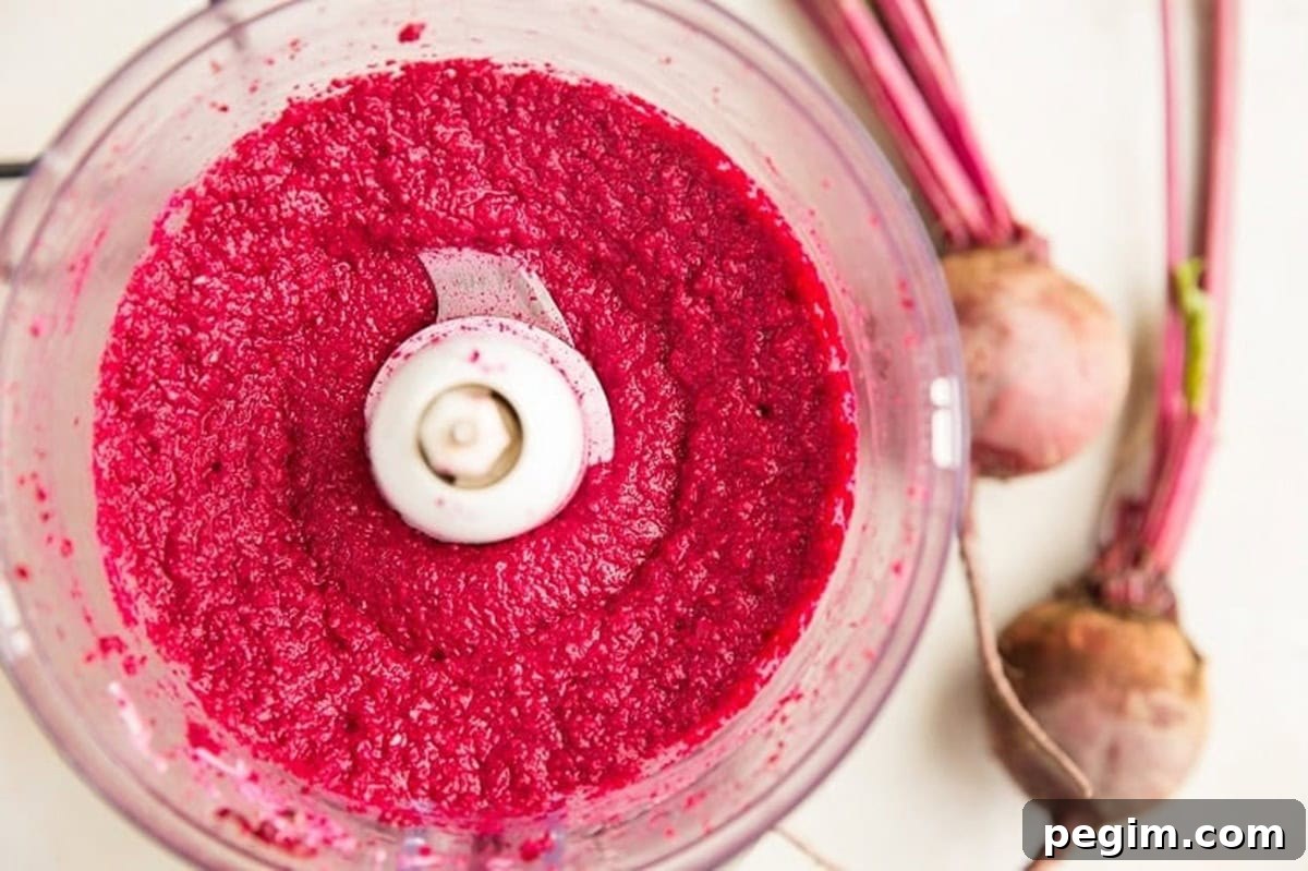 Finished creamy beet pesto in a food processor