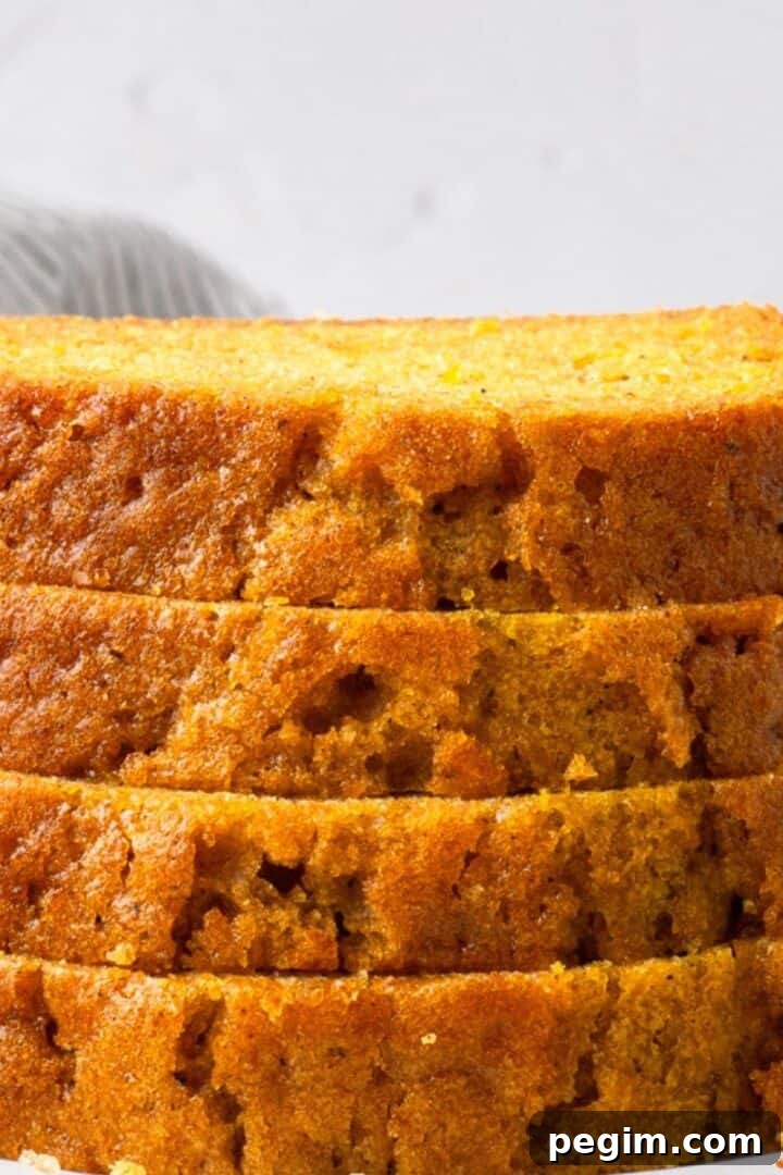 Super Soft Gluten Free Pumpkin Bread stacked and showing the inside texture