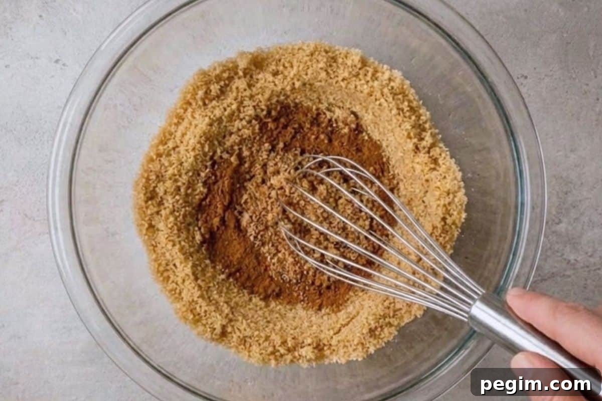 Combine remaining brown sugar with cinnamon and nutmeg in a separate bowl 