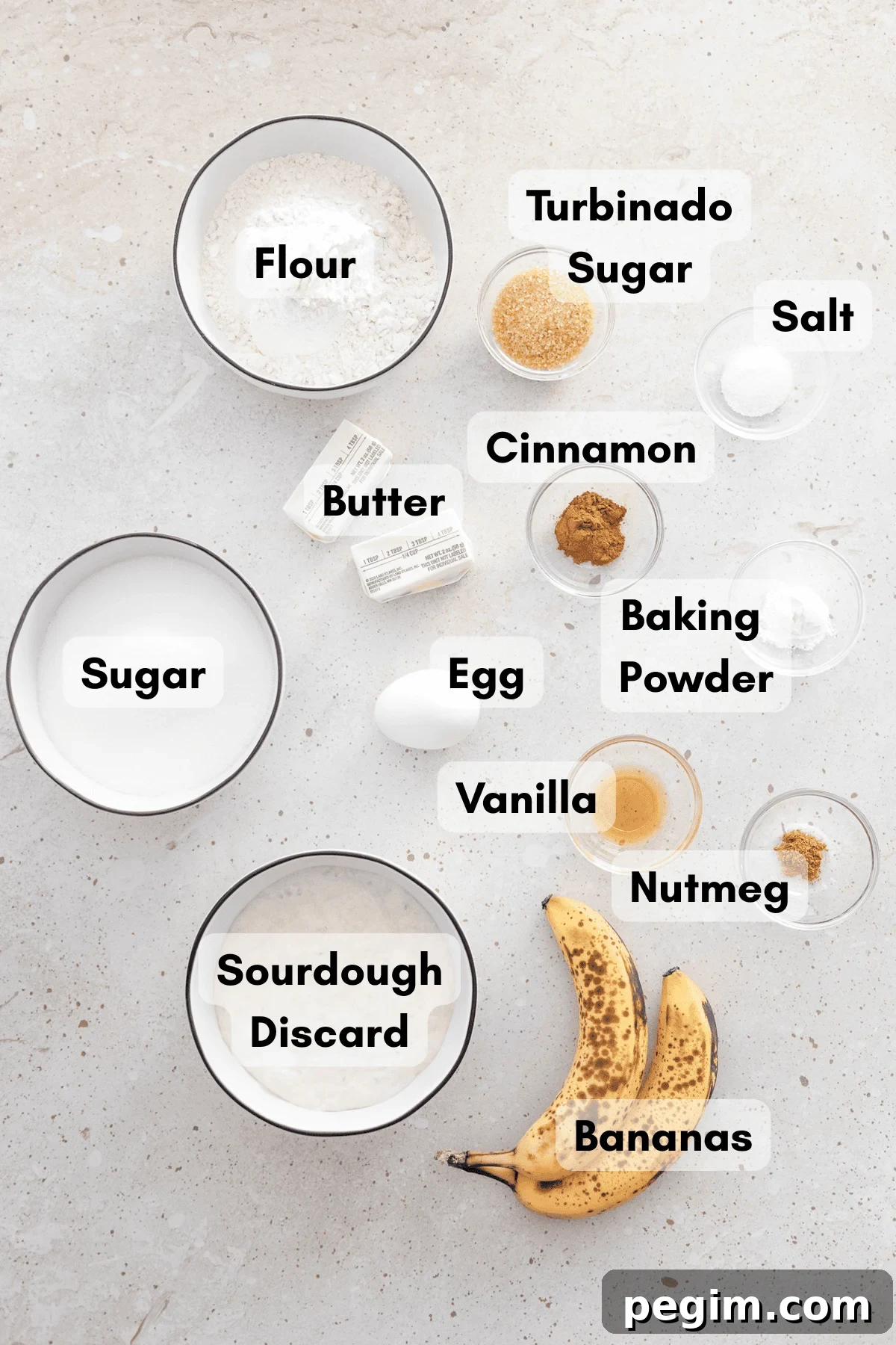 Ingredients for Sourdough Discard Banana Muffins in small bowls.