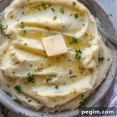 Square image of rosemary garlic mashed potatoes.
