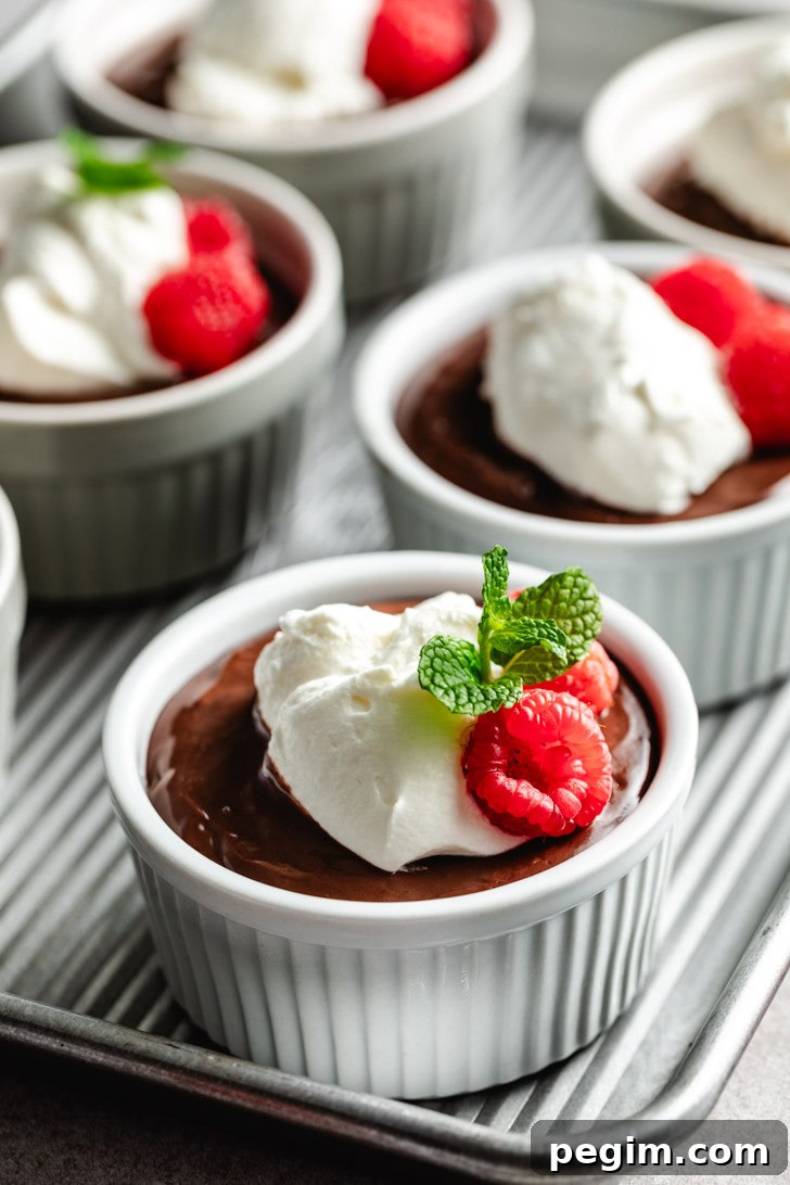 A ramekin of creamy chocolate pudding.